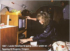 1987 - Levn trying to turn the video on during a flight to Eugene, Oregon.
